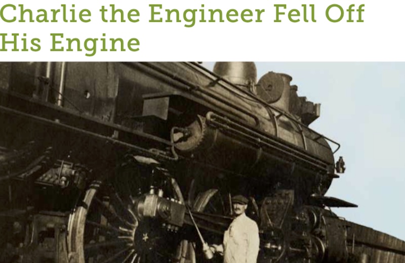 large train behind man